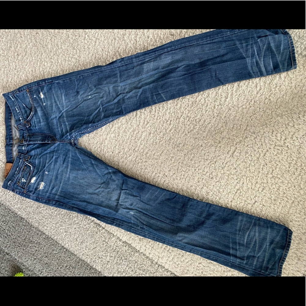 Men’s J Brand Kane slim cut jeans with rips.